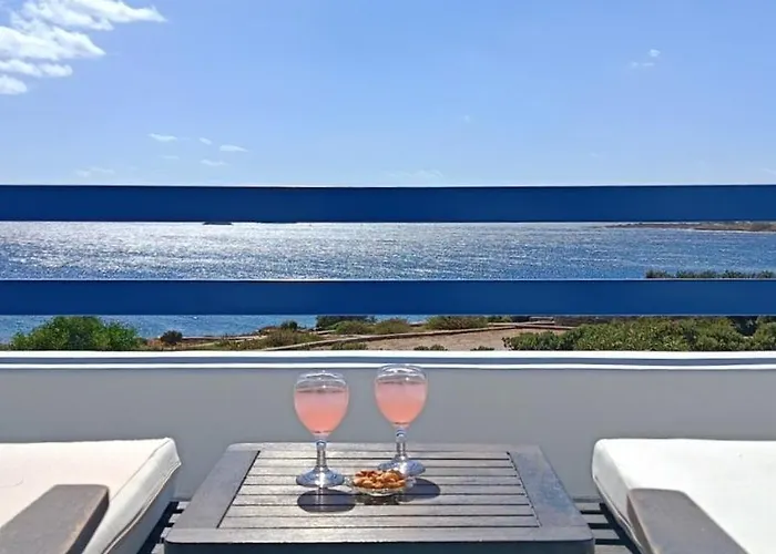 Aura Paros لوغاراس